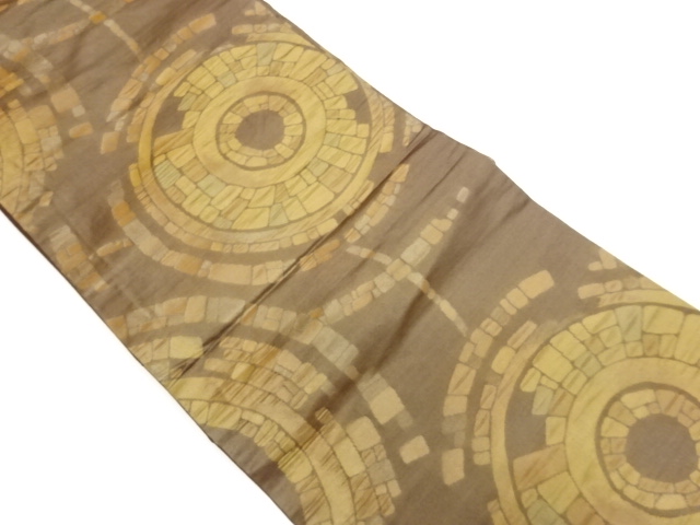 丸に抽象模様織出し名古屋帯